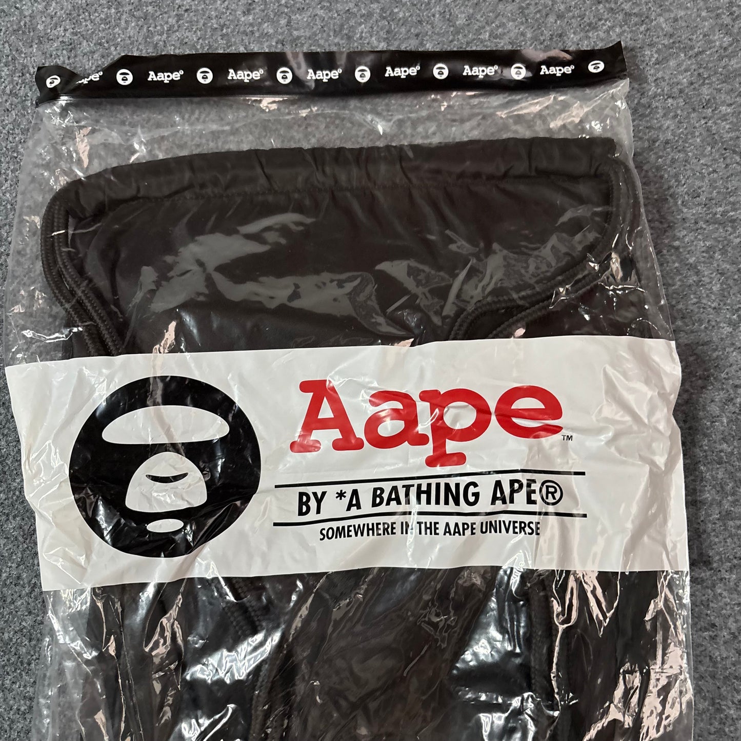 Aape drawstrings bag black