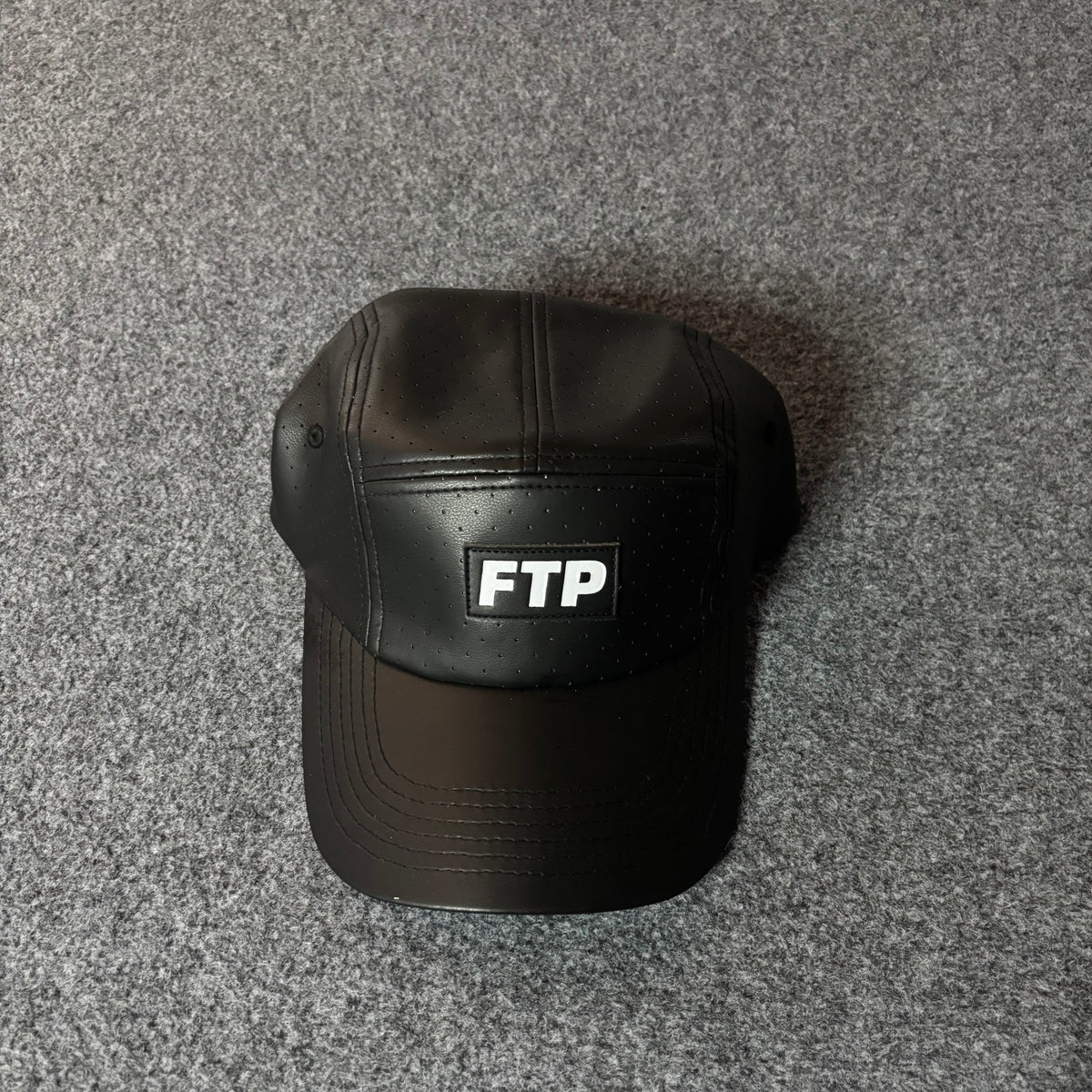Fuck The Population perforated leather hat