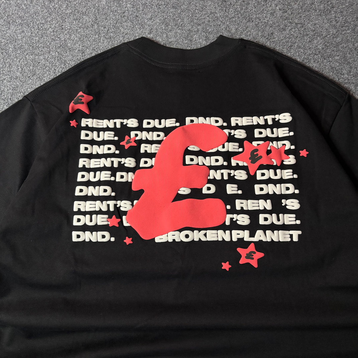 Broken Planet rents due black tee