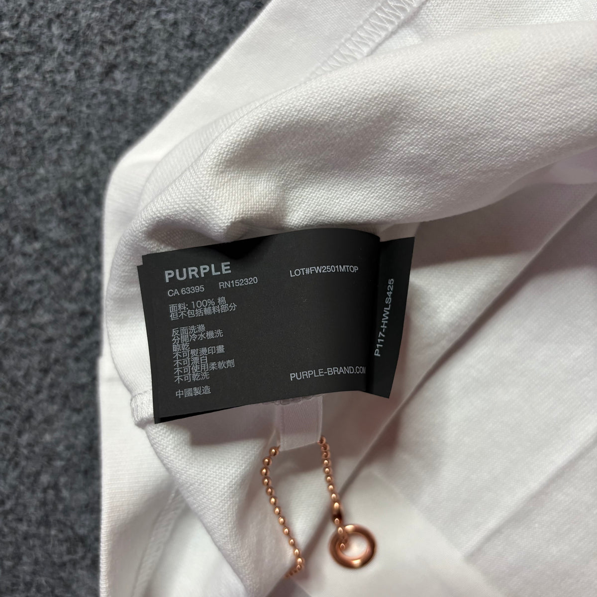 Purple brand script logo white tee