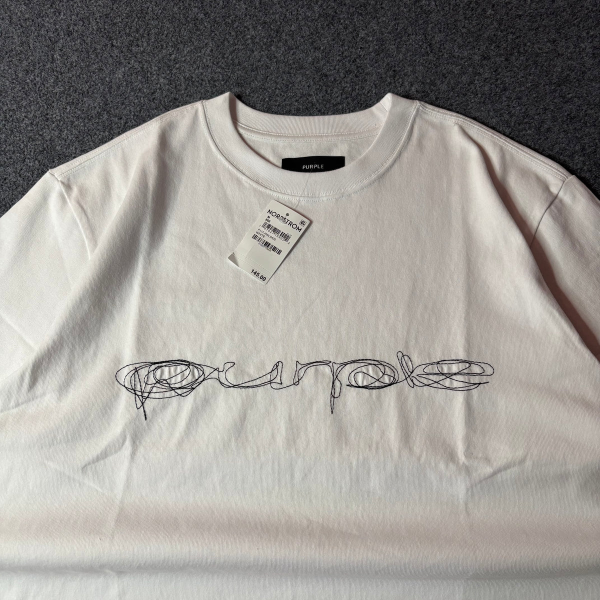 Purple brand script logo white tee