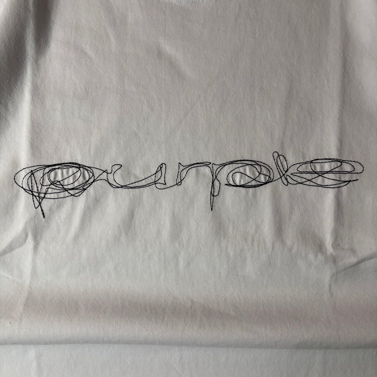 Purple brand script logo white tee