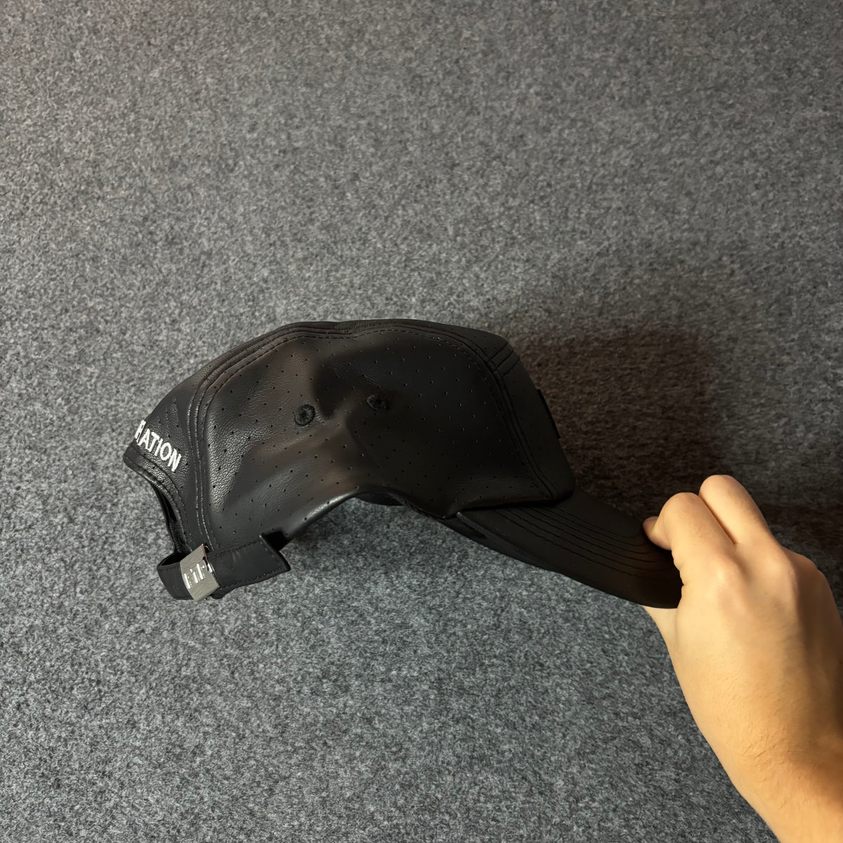 Fuck The Population perforated leather hat