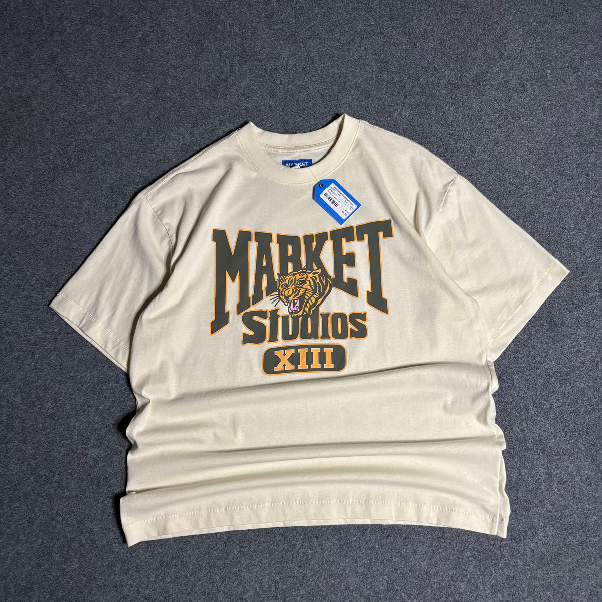 Market studios tiger university tee