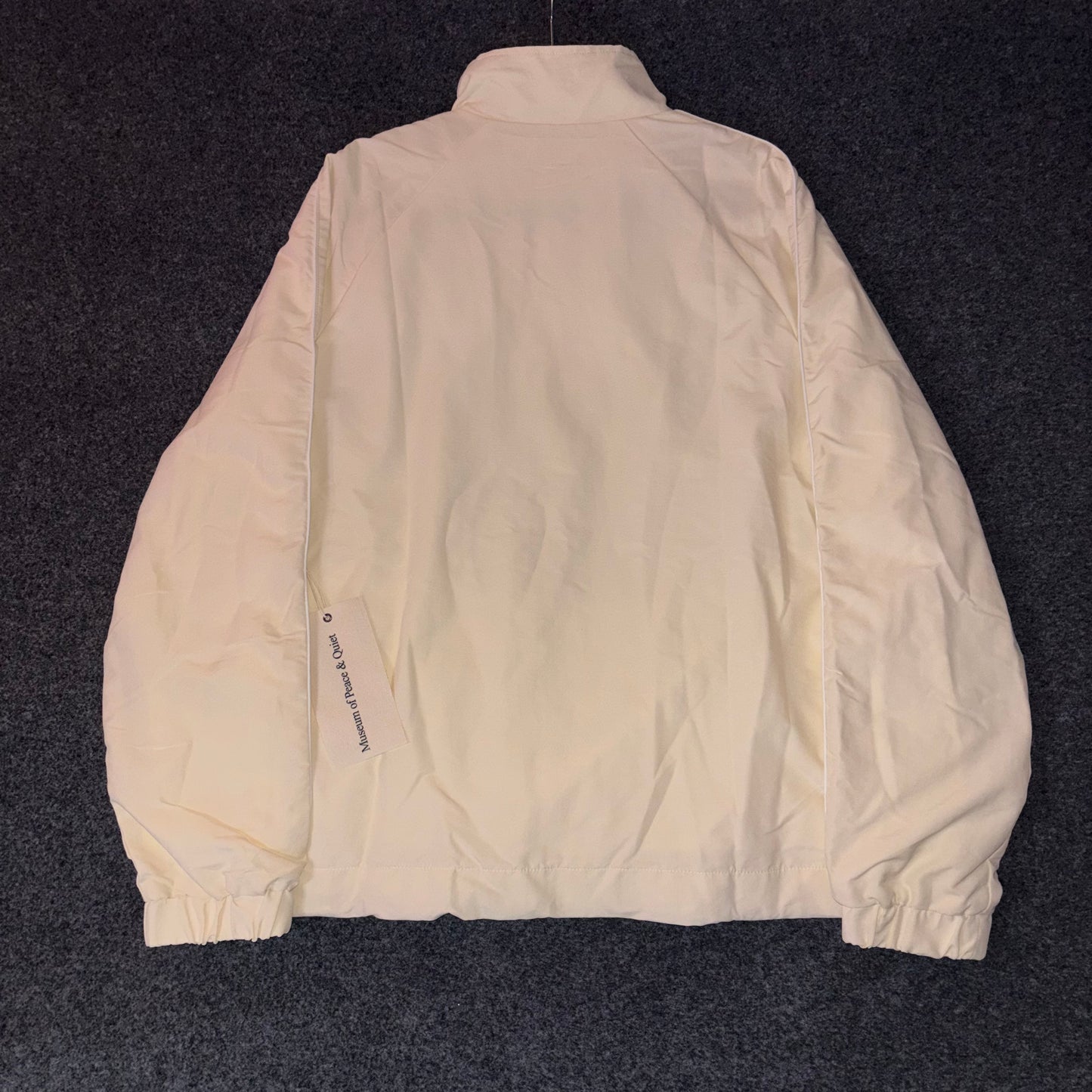 Museum of peace and quiet Wordmark Nylon Quarter Zip
Bone