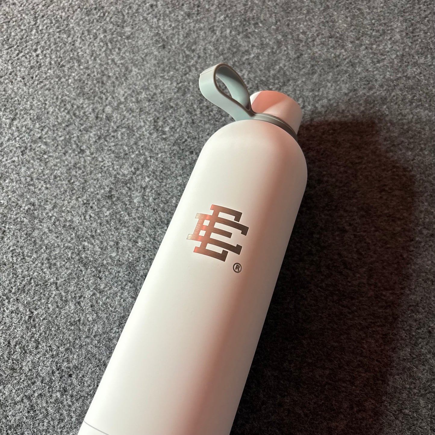 Eric Emanuel water bottle core metal white grey