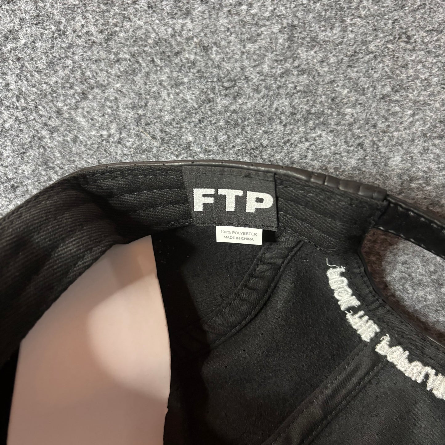 Fuck The Population perforated leather hat