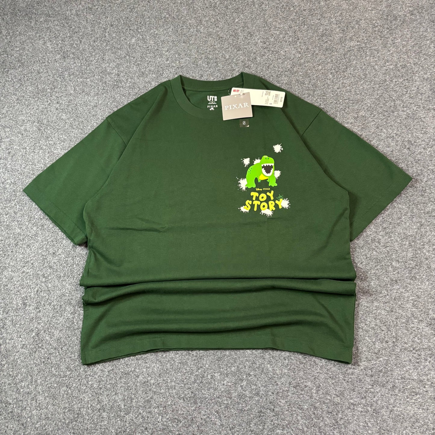 Uniqlo x Pixar Toy Story Rex tee green