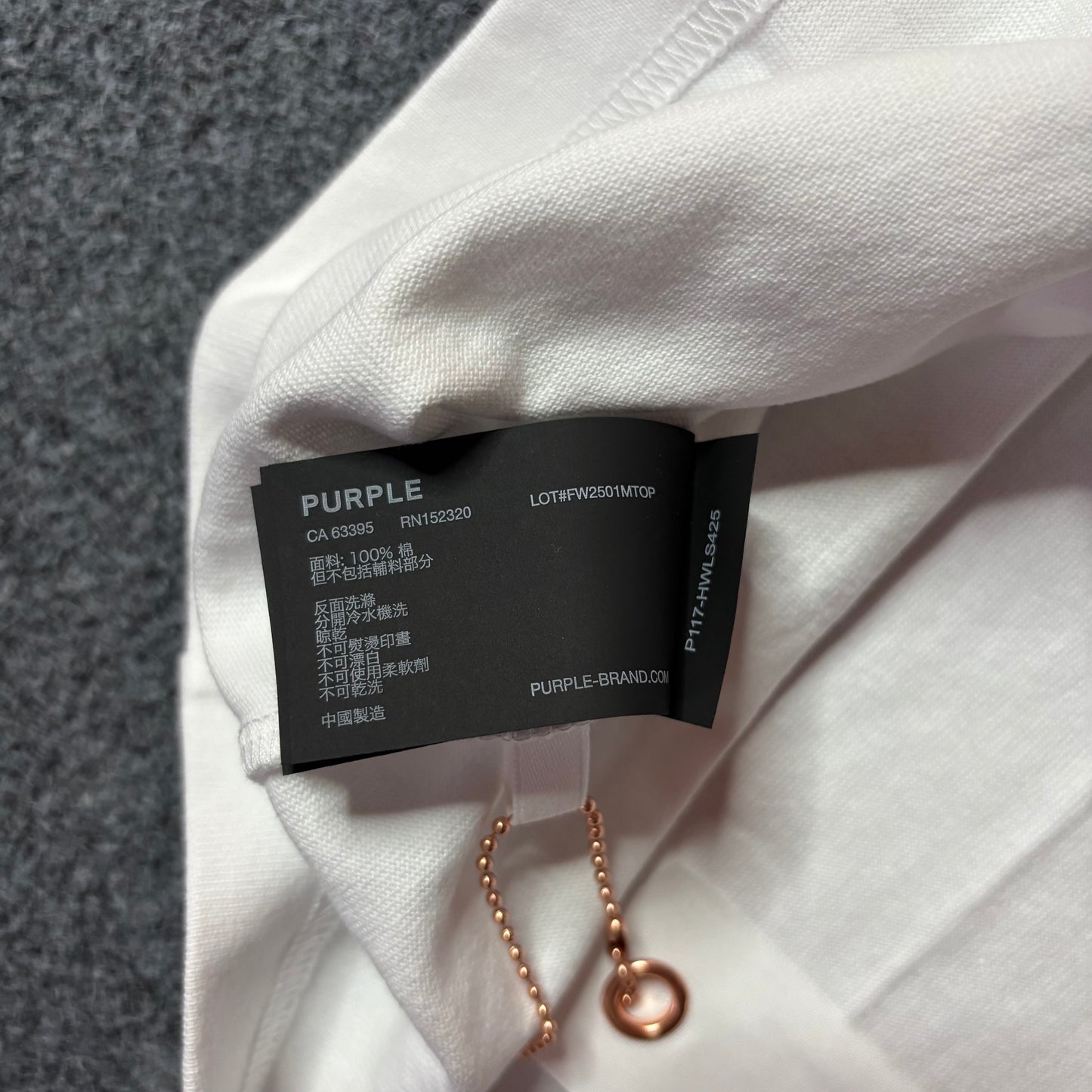 Purple brand script logo white tee
