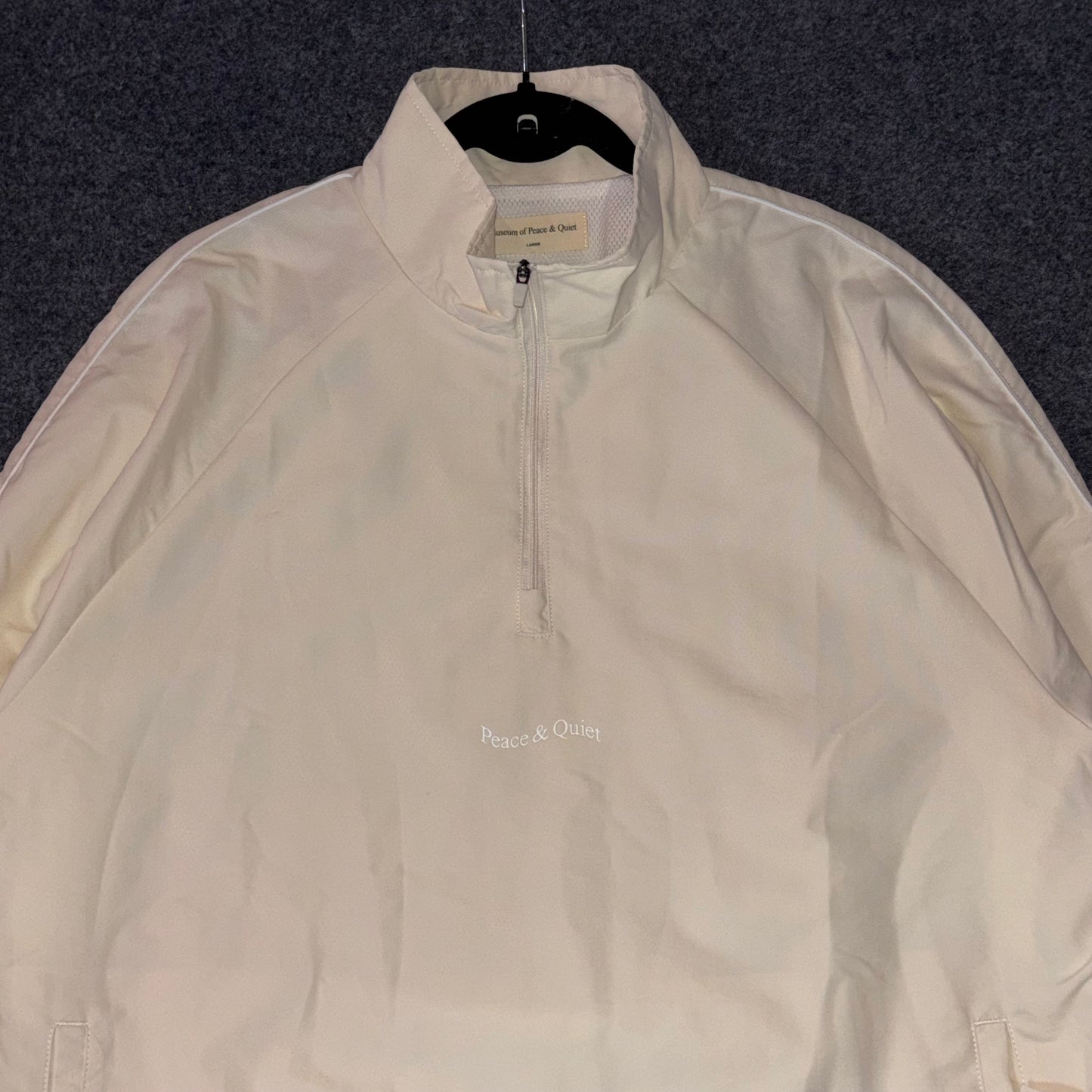 Museum of peace and quiet Wordmark Nylon Quarter Zip
Bone