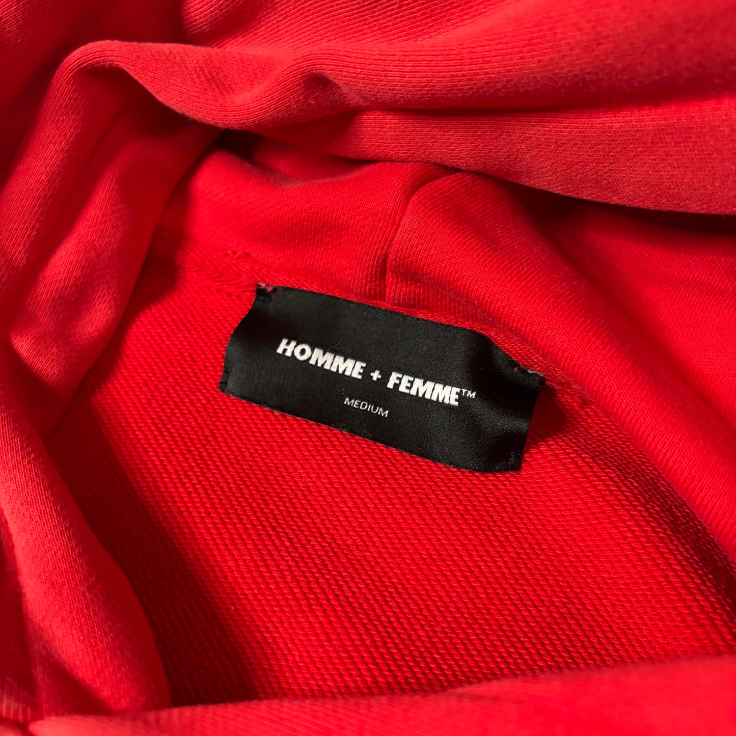 Homme Femme Mardi Gras’s red hoodie