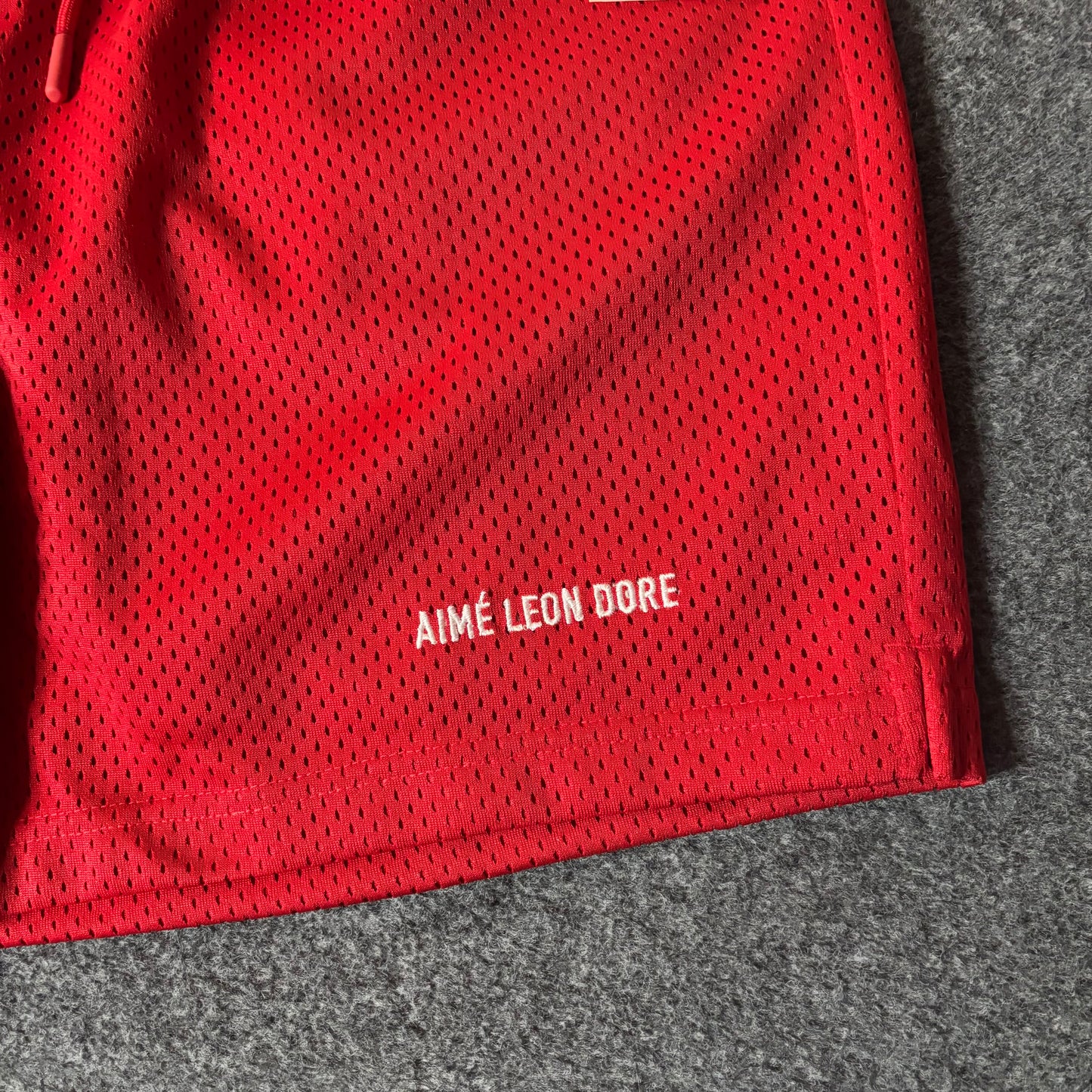 Aime Leon Dore mesh gym short true red