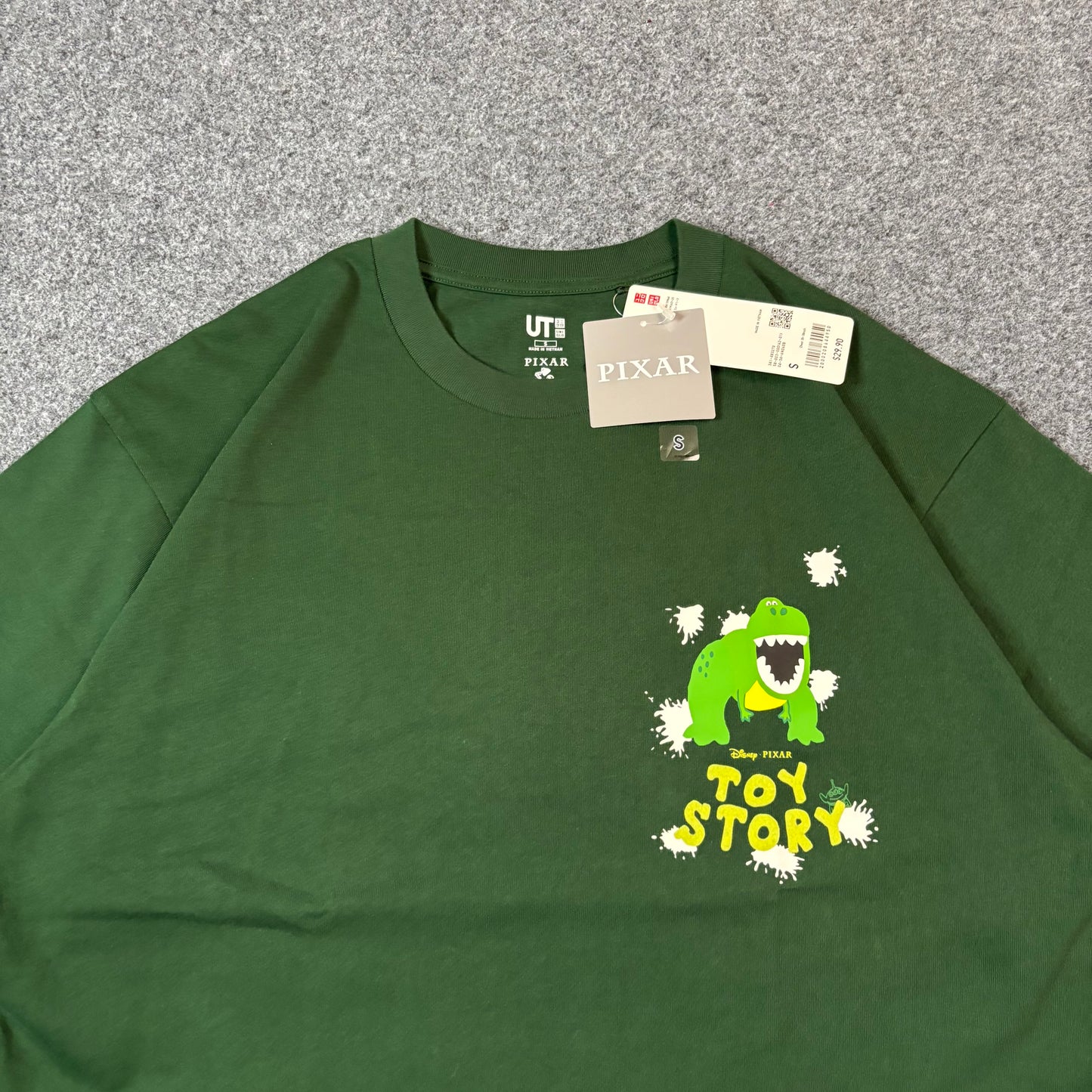 Uniqlo x Pixar Toy Story Rex tee green