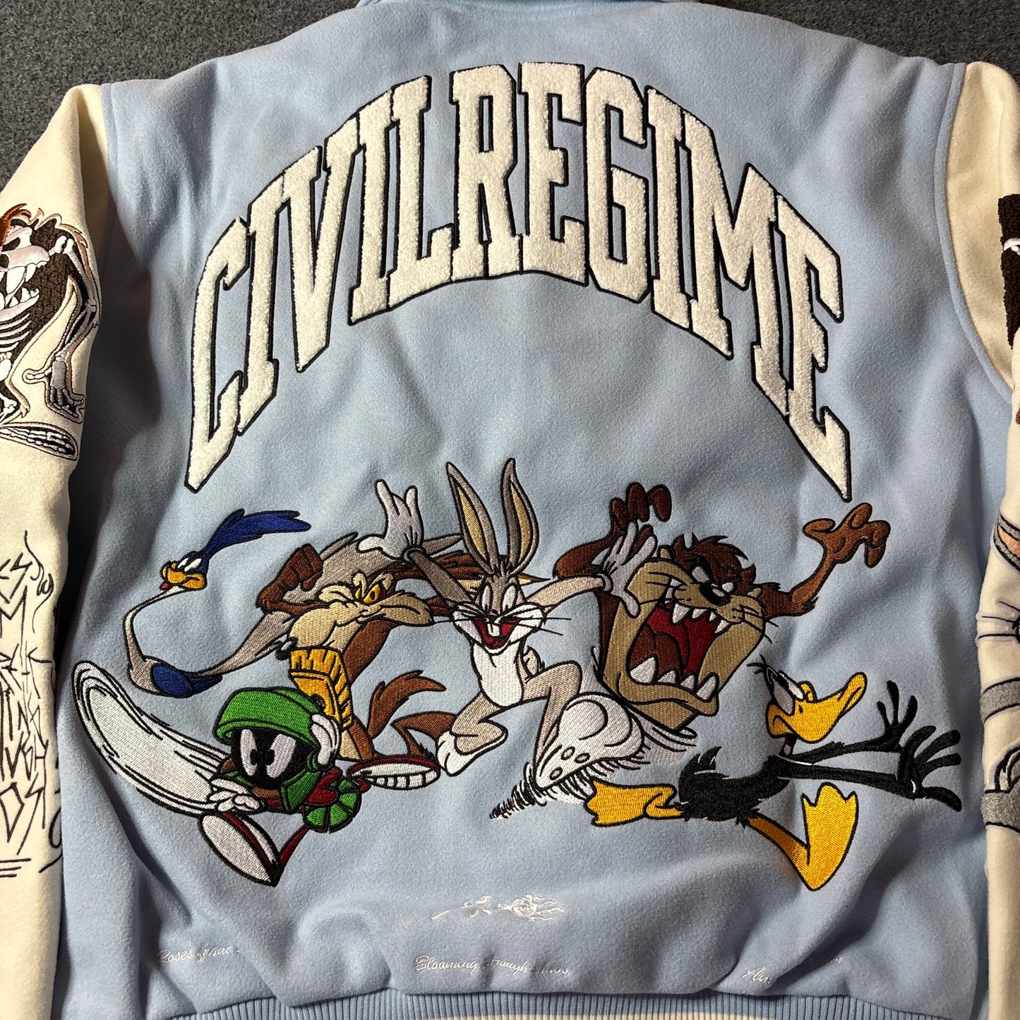 Civil Regime x Looney tunes varsity jacket light blue
