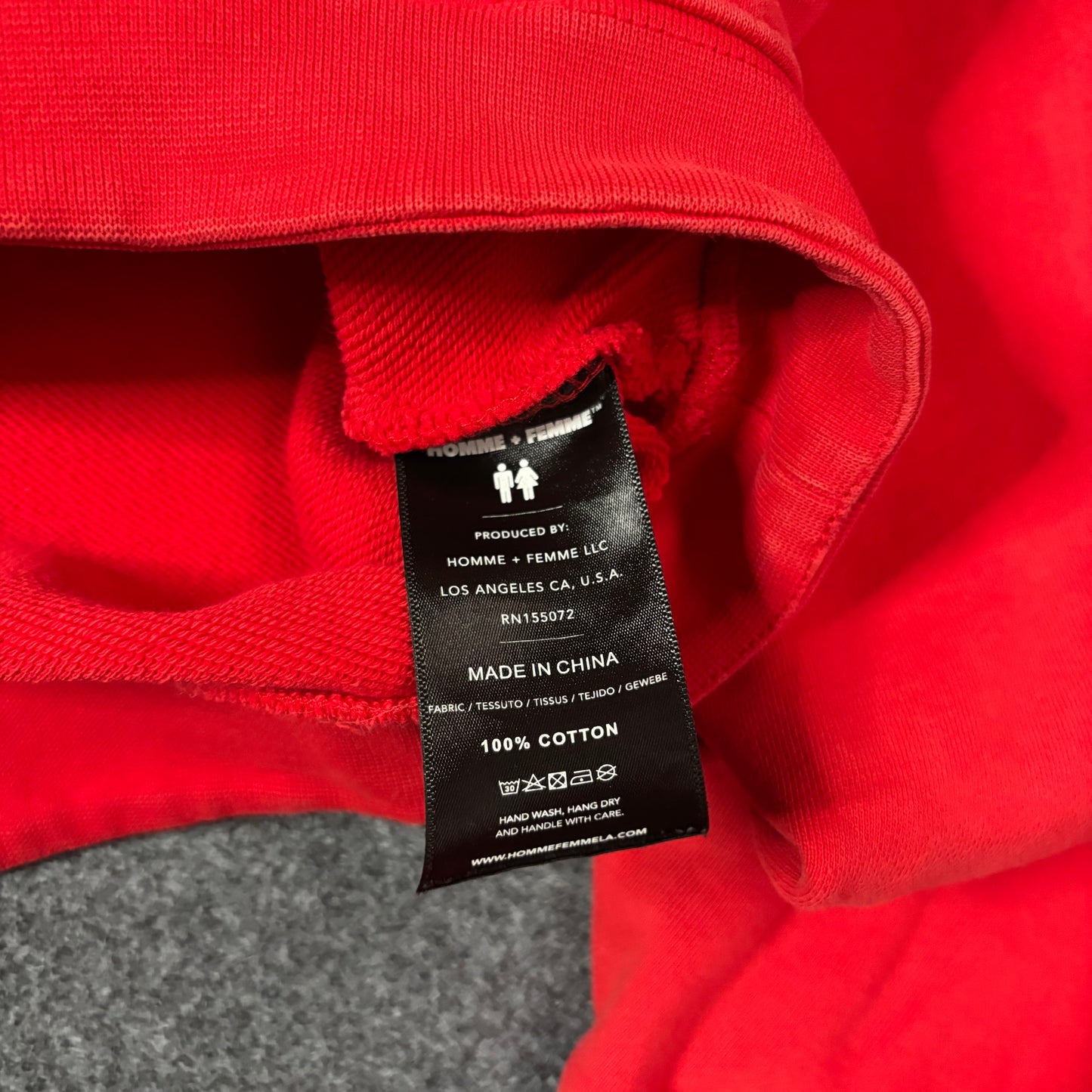 Homme Femme Mardi Gras’s red hoodie