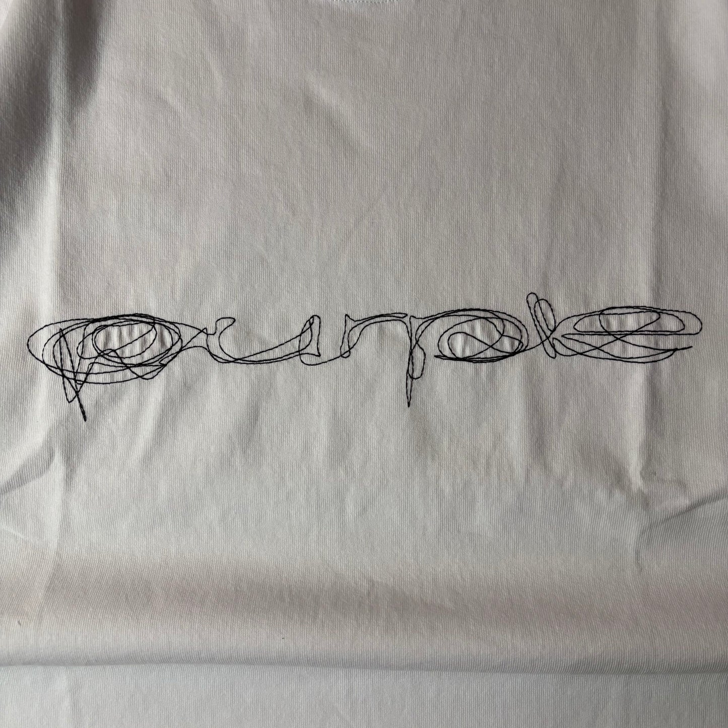 Purple brand script logo white tee