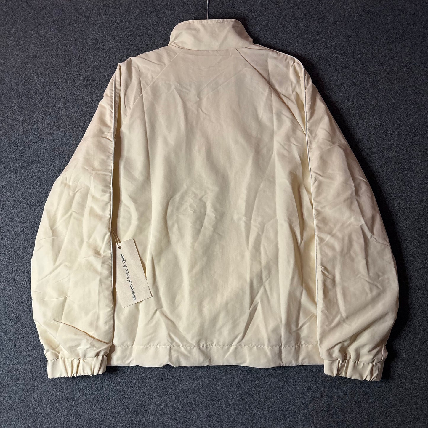 Museum of peace and quiet Wordmark Nylon Quarter Zip
Bone