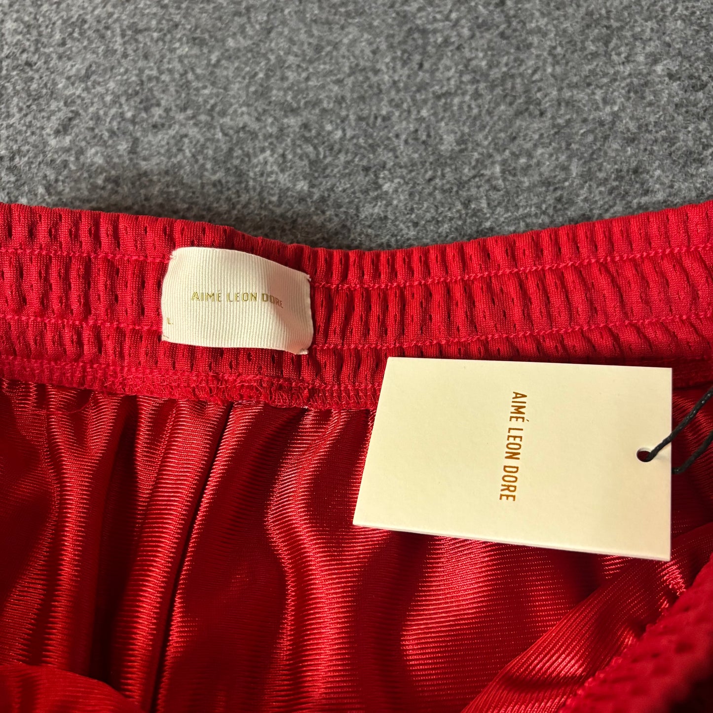 Aime Leon Dore mesh gym short true red
