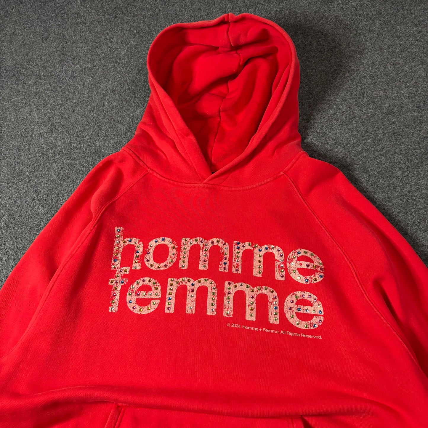 Homme Femme Mardi Gras’s red hoodie