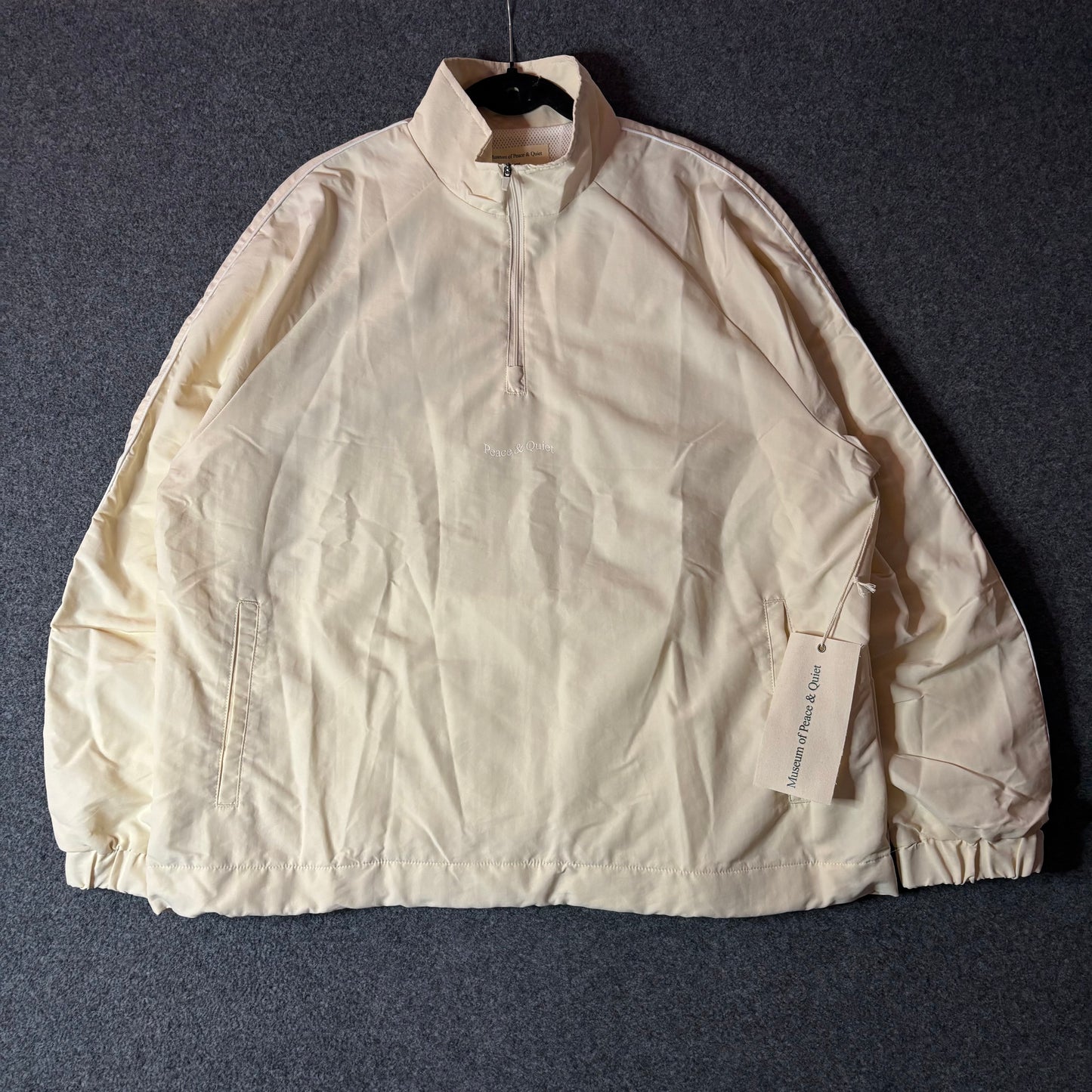 Museum of peace and quiet Wordmark Nylon Quarter Zip
Bone