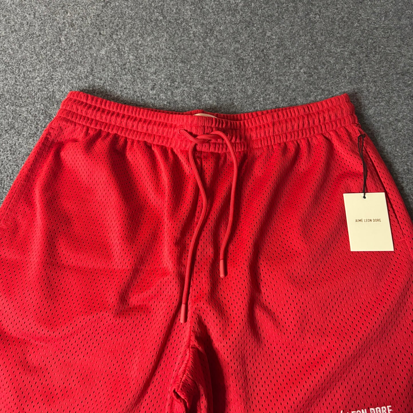 Aime Leon Dore mesh gym short true red