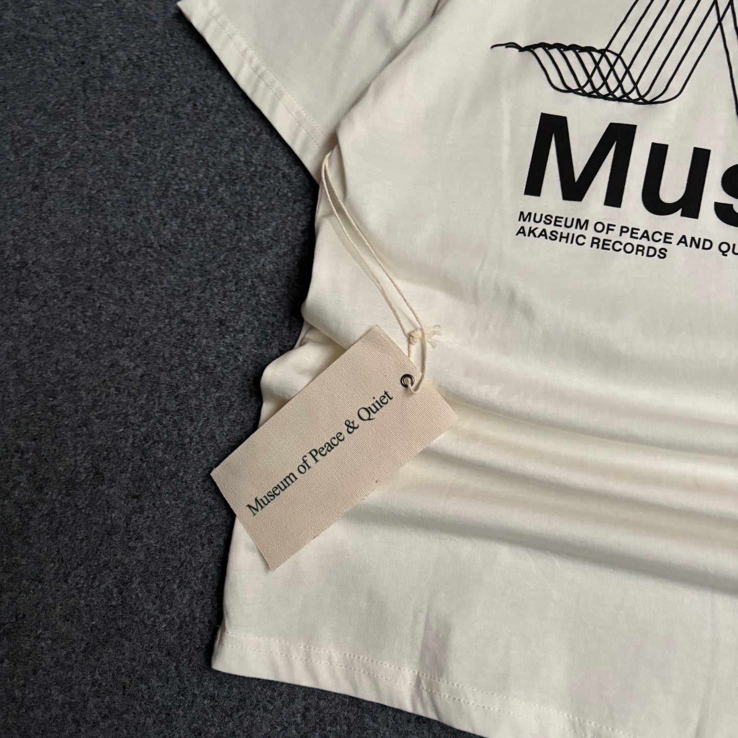 Museum of peace and quiet sounds of waves tee bone white