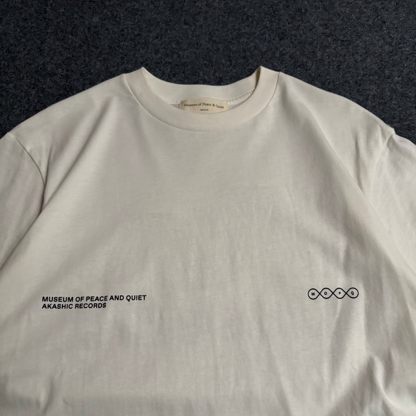 Museum of peace and quiet sounds of waves tee bone white