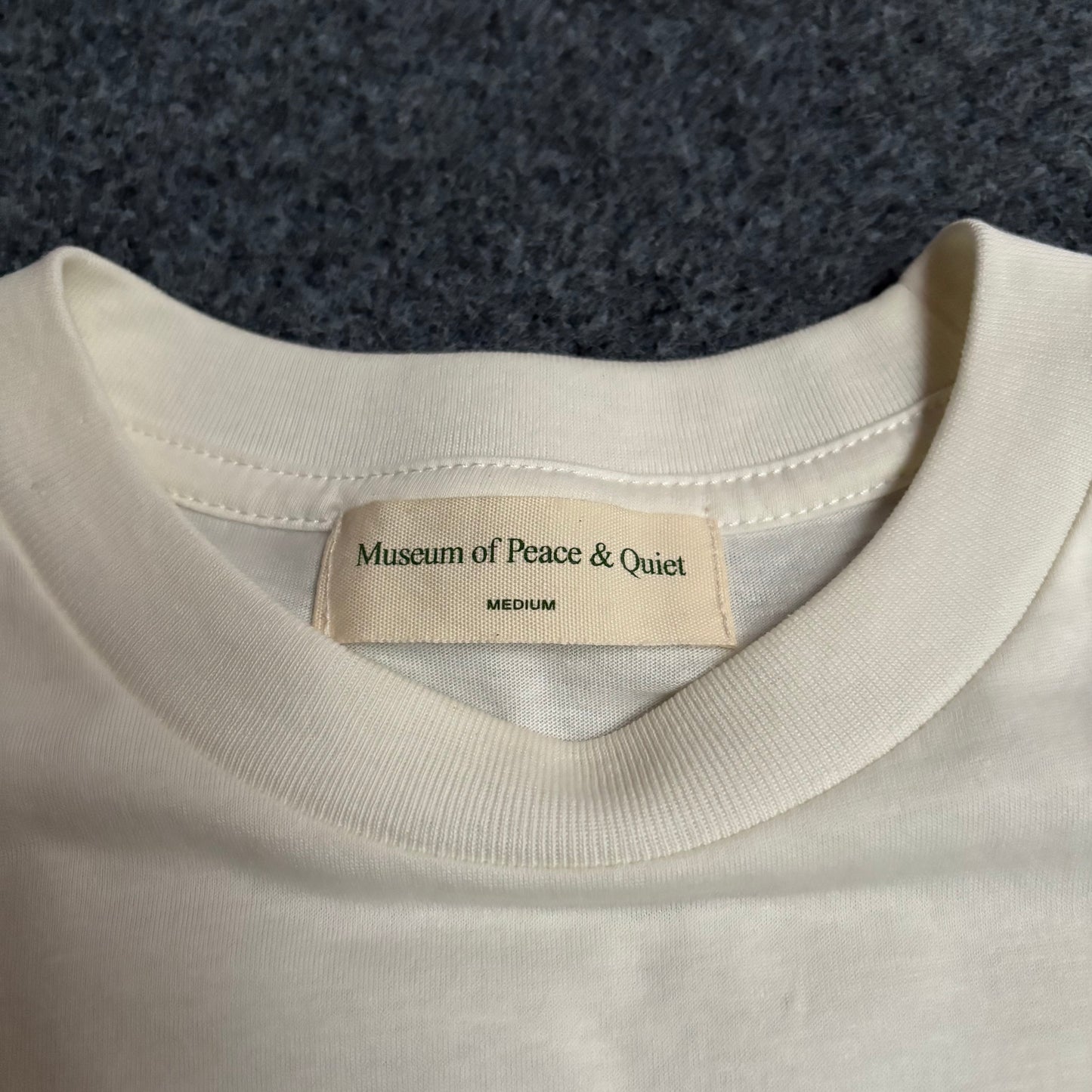 Museum of peace and quiet sounds of waves tee bone white