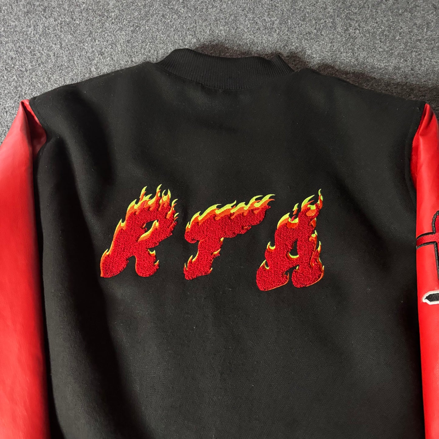 RTA varsity jacket flames logo