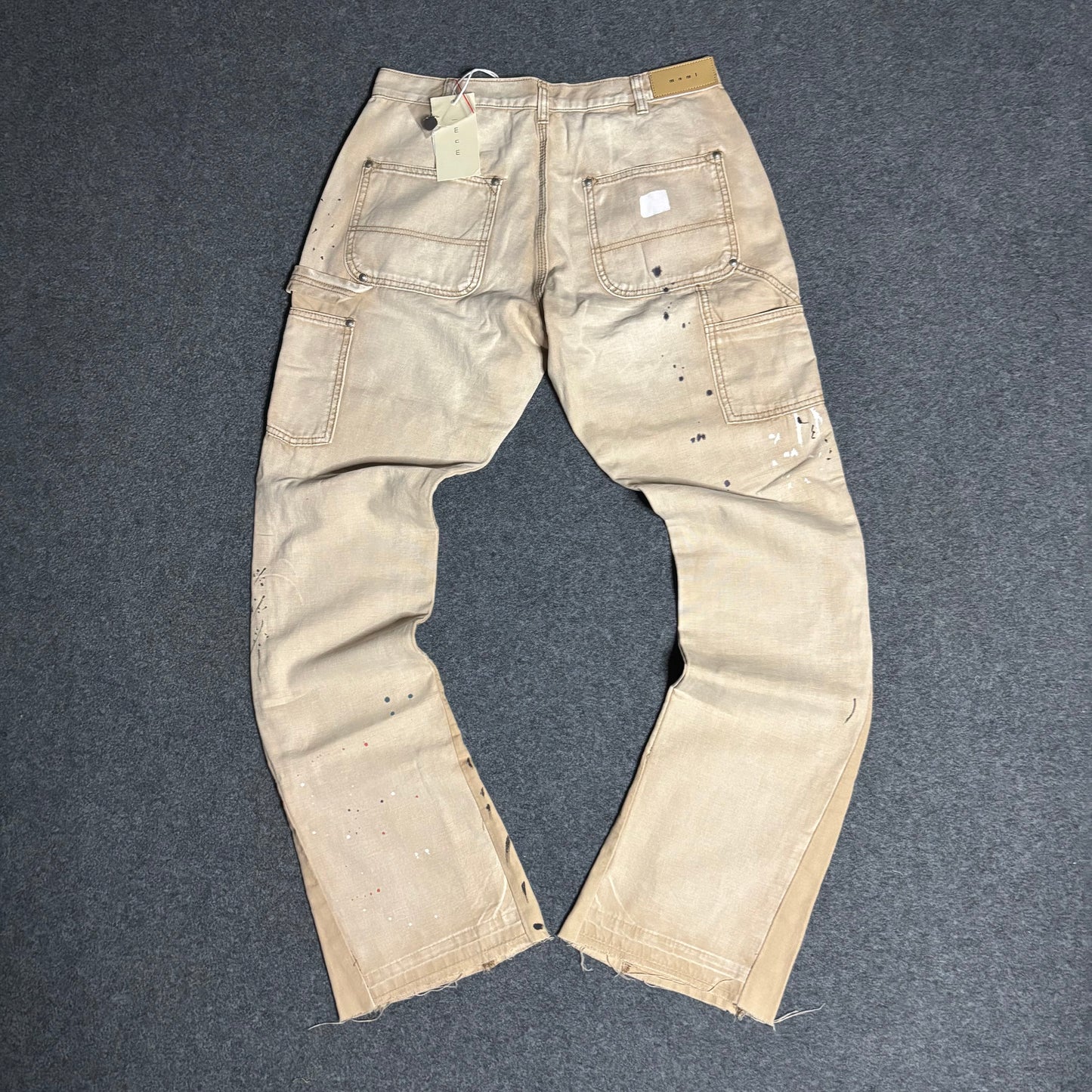 Mnml double knee flared paint splattered pants