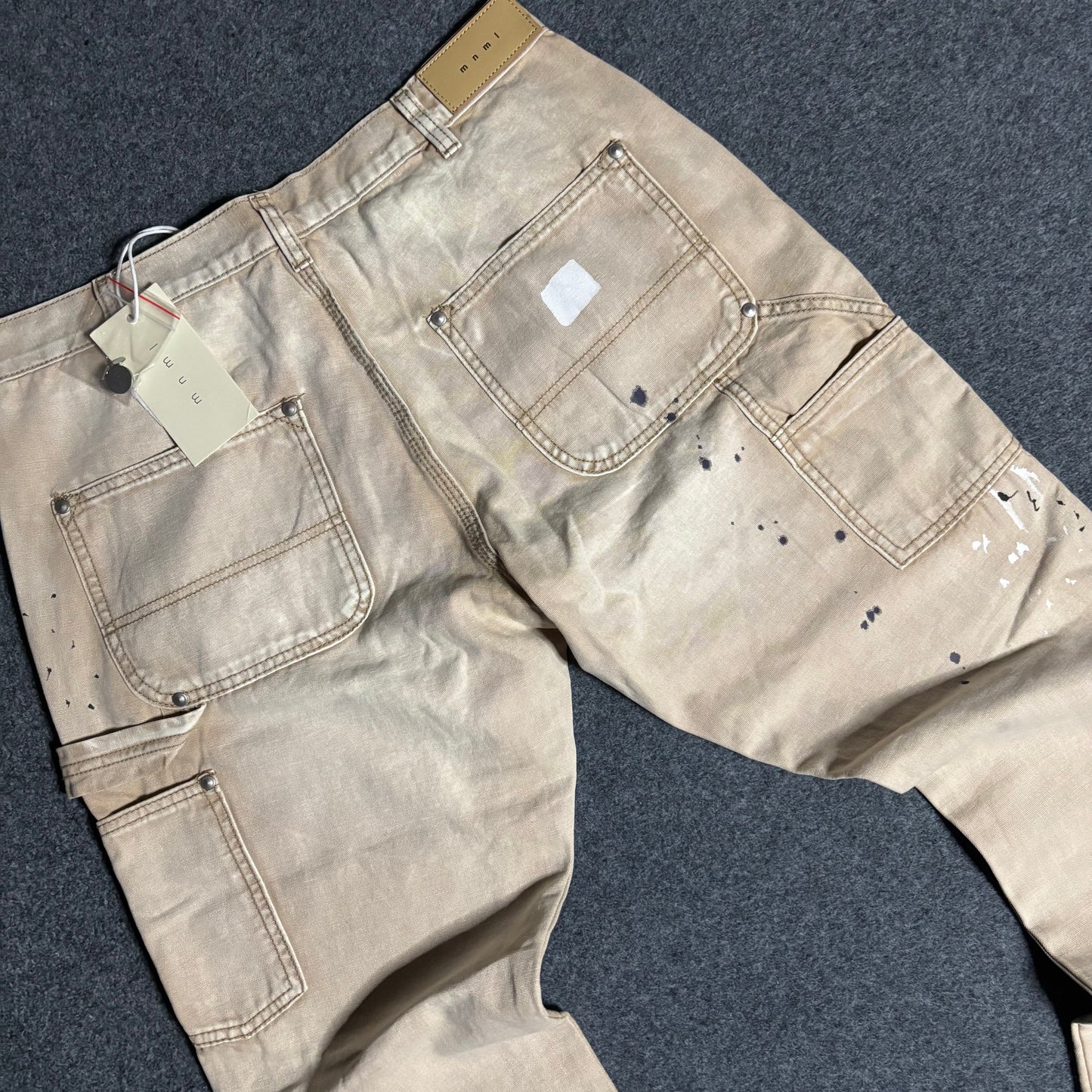 Mnml double knee flared paint splattered pants