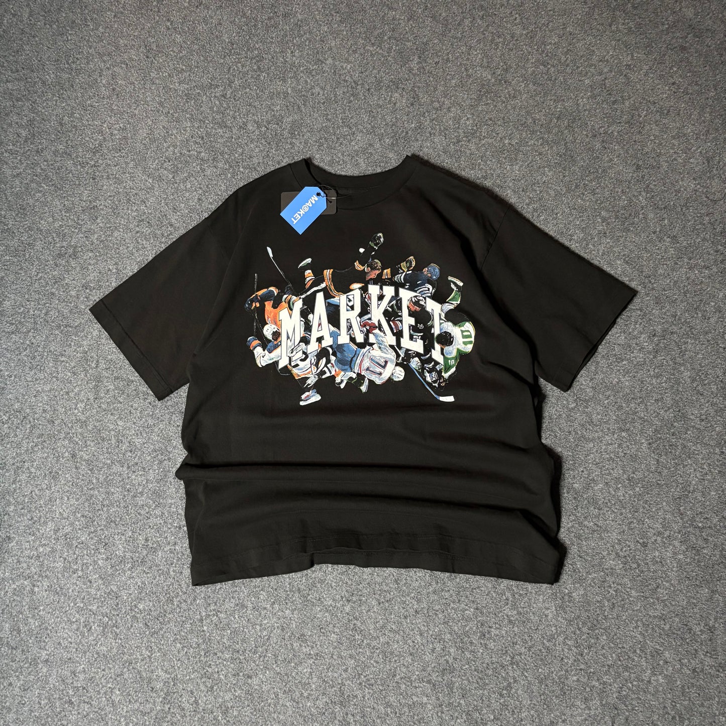 Market Studios hockey logo tee