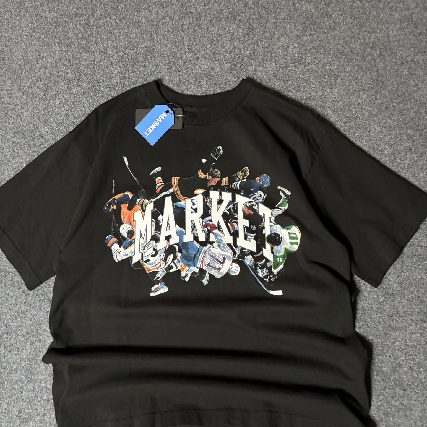 Market Studios hockey logo tee